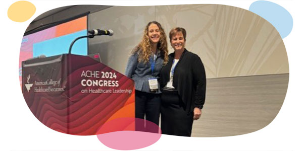 three young nurses at a conference.