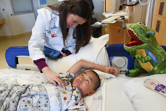 Dr. Monduy with patient Tamryn